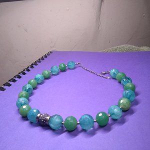 Large blue bead and silver tone ball necklace